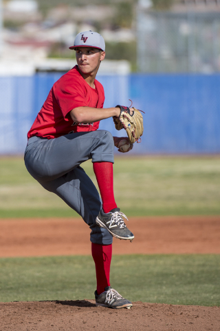 Las Vegas High School’s Austin Strong (12) pitches against Basic at Basic High School ...
