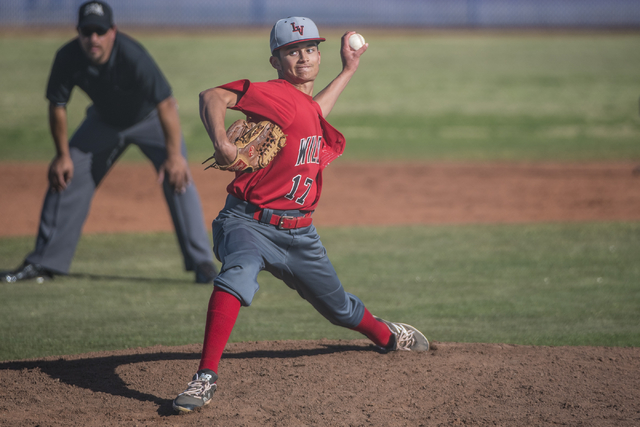 Las Vegas High School’s Kevin Verduzco (17) pitches against Basic at Basic High School ...