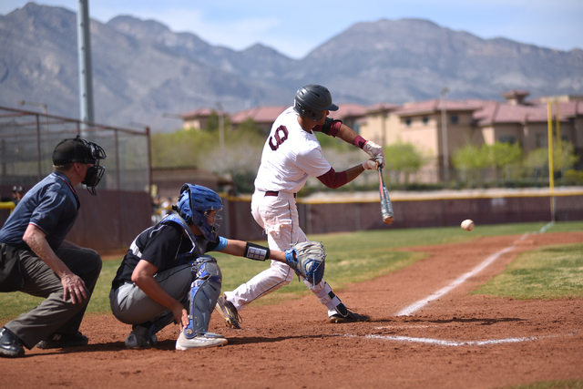 Faith Lutheran’s Joshua Harmonay (9) swings at a pitch against Canyon View (Utah) duri ...