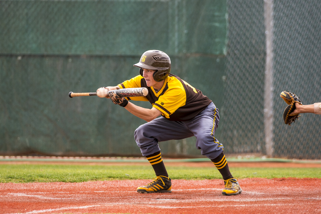 Bonanza outfielder Levi Clump (16) bunts against Spring Valley at Spring Valley High School ...