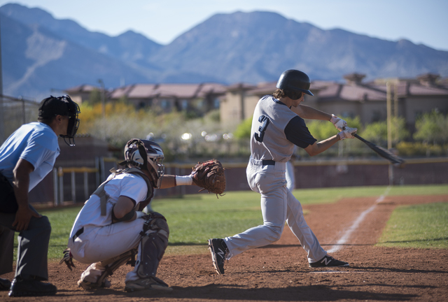 Spring Valley’s Carter Lambeth (3) swings for a strike against Faith Lutheran high sch ...