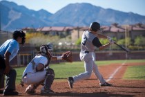Spring Valley’s Carter Lambeth (3) swings for a strike against Faith Lutheran high sch ...
