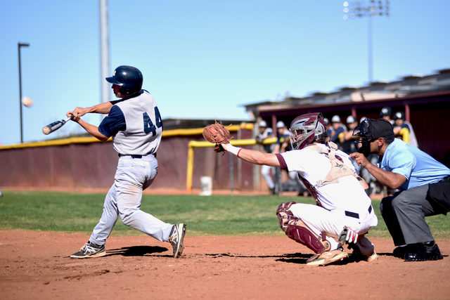 Spring Valley’s Nick Rupp (4) swings for contact against Faith Lutheran high school du ...