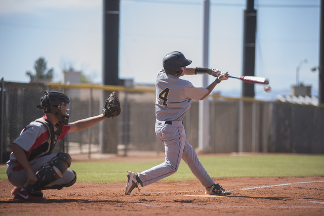 Boulder City’s Michael Morelli (4) makes contact with the ball against Tech during the ...