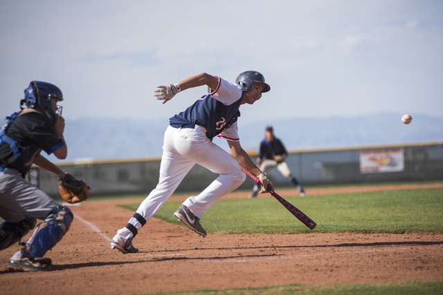 Coronado’s Dakota Humphries (25) bunts the ball against Basic during their baseball ga ...