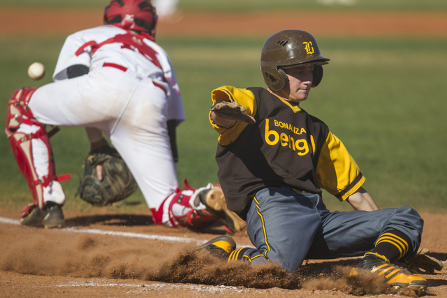 Bonanza’s Levi Klump (16) slides home to score a run against Arbor View at Arbor View ...