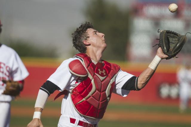 Arbor View catcher Joe Fitzhugh (16) makes an infield catch for an out against Bonanza at Ar ...