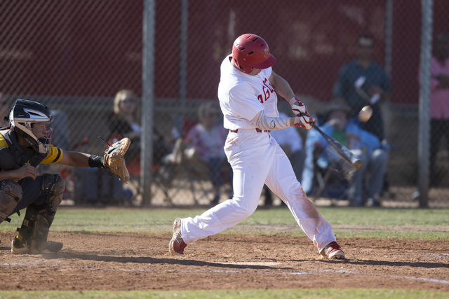 Arbor View’s Nick Roeper (1) connects with the ball for a hit against Bonanza at Arbor ...
