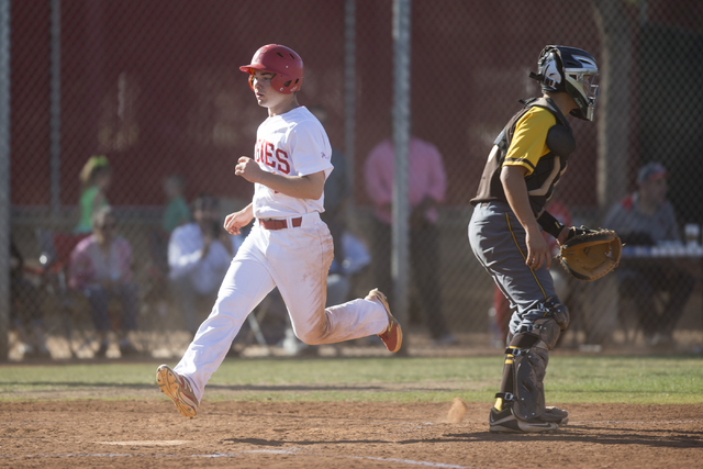 Arbor View’s Nick Roeper (1) scores a run against Bonanza at Arbor View High School in ...