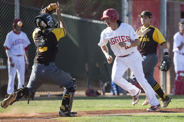 Arbor View’s Nick Quintana (12) scores a run against Bonanza at Arbor View High School ...