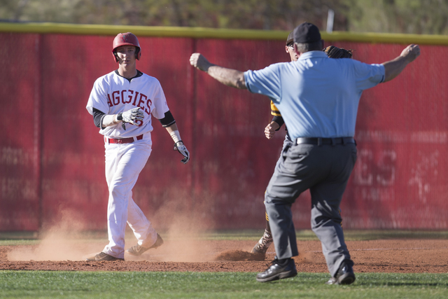 Arbor View’s Joe Fitzhugh (16) is called safe at third base against Bonanza at Arbor V ...