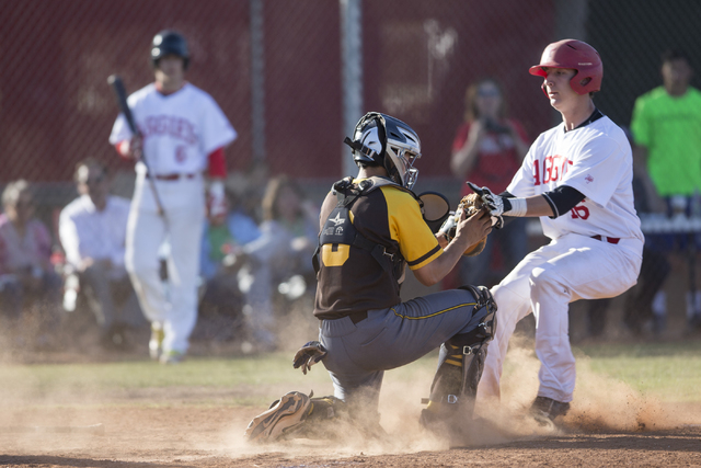 Arbor View’s Joe Fitzhugh (16) is tagged out by Bonanza’s catcher Micah Higa at ...