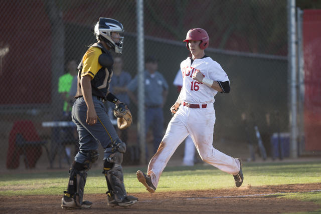 Arbor View’s Joe Fitzhugh (16) scores the winning run against Bonanza at Arbor View Hi ...