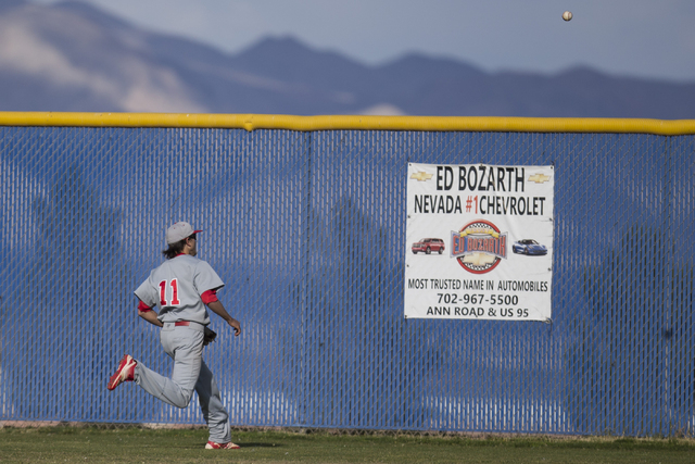 Arbor View’s Jayce Gardner (11) runs for the ball in the outfield during a hit by Cent ...