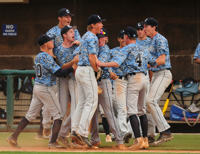 Centennial players celebrate their 6-5 win over Bishop Gorman during their prep baseball gam ...