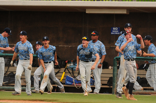 Centennial players celebrate their 6-5 win over Bishop Gorman during their prep baseball gam ...