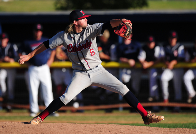 Liberty relief pitcher Zack Reed delivers to Coronado in the seventh inning of their prep ba ...