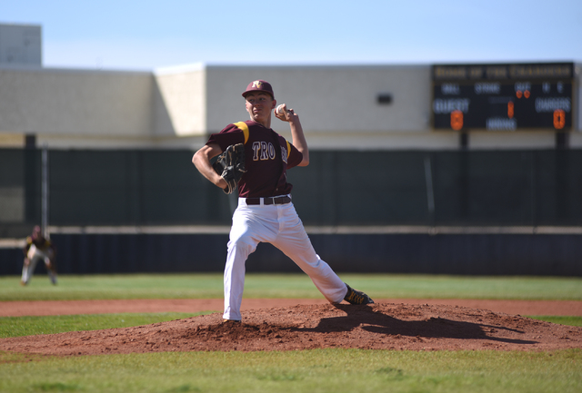 Pahrump Valley’s Garret Lucas pitches against Clark during their baseball game played ...
