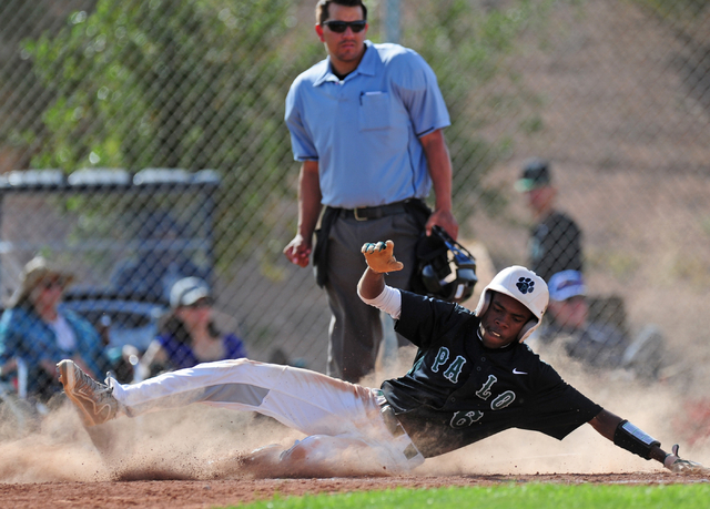 Palo Verde base runner Wesley Cosby scores a run against Desert Oasis in the third inning of ...