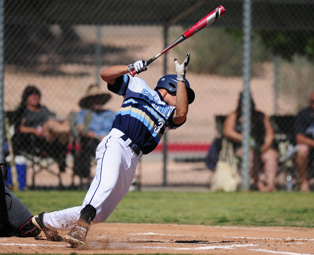 Foothill batter Jack Fredericksen falls after swinging at a Las Vegas pitch in the first inn ...