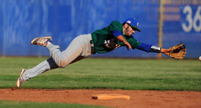 Green Valley shortstop A.J. Amelburu almost snares a Basic base hit in the fifth inning of t ...