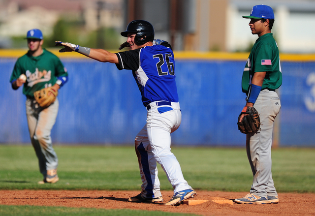 Basic batter Trent Bixby gestures to the dugout after hitting a double while Green Valley se ...