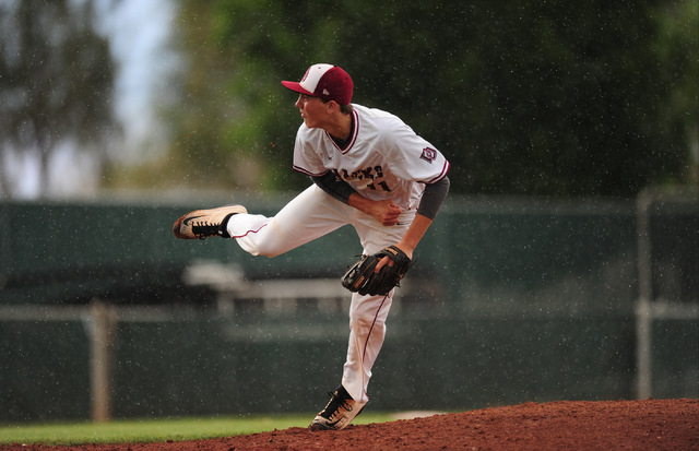 Desert Oasis starting pitcher Brett Brocoff delivers to Shadow Ridge in the fourth inning of ...