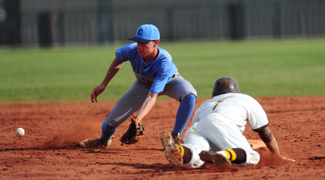 Bonanza baserunner Torren Brozovich steals second base as Centennial second baseman Kian Wil ...