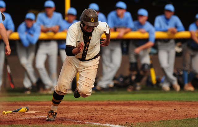 Bonanza batter Hilario Gomez-Soto advances to first base on a dropped third strike in the se ...