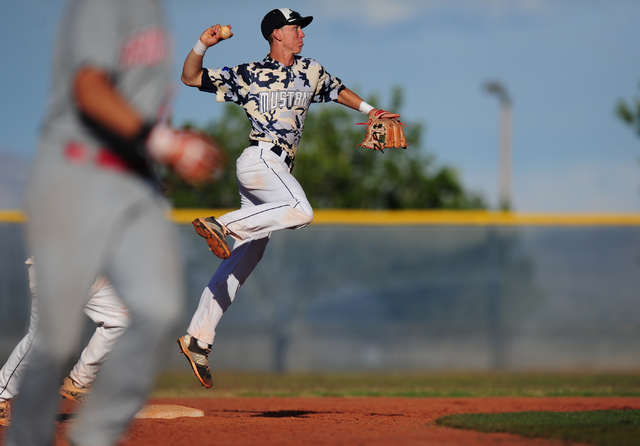 Shadow Ridge second baseman Isaiah Blaylock turns a game ending double play in the seventh i ...