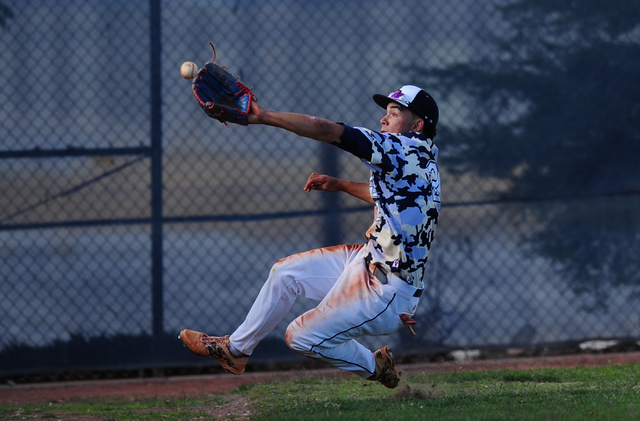 Shadow Ridge left fielder Eric Jordan is unable to catch an Arbor View foul ball in the sixt ...