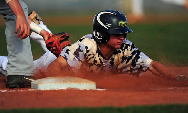 Shadow Ridge baserunner Koby Millner is tagged out by Arbor View third baseman Austin Pfeife ...