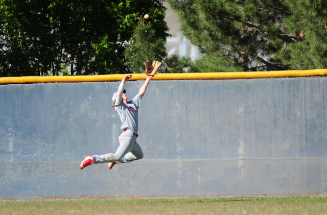 Arbor View center fielder Brandon Stevens is unable to catch a Shadow Ridge fly ball in the ...