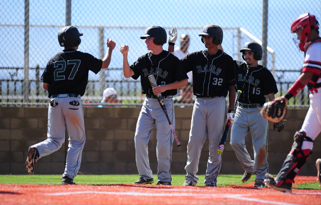 Rancho baserunner Anthony Guzman (27) high fives teammates after he scored a run against Las ...