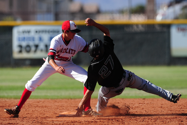 Las Vegas shortstop Nathan Freimuth tags out Rancho baserunner Anthony Guzman after Guzman t ...