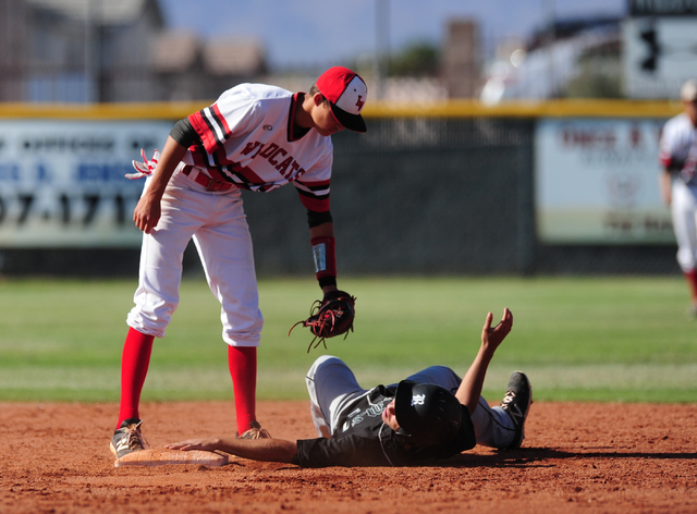 Las Vegas shortstop Nathan Freimuth tags out Rancho baserunner Anthony Guzman after Guzman t ...