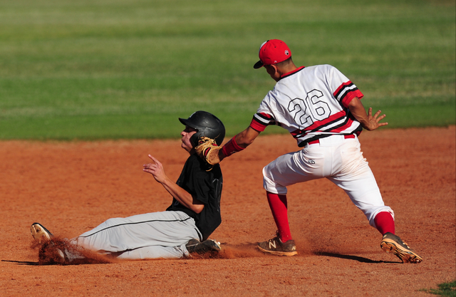 Las Vegas second baseman Hector Perez tags out Rancho baserunner Joey Walls after Walls trie ...