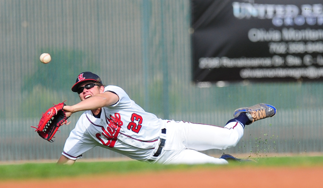 Liberty outfielder Ryan Meservey is unable to catch a Silverado pop fly in the fifth inning ...