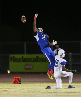 Basic’s DeShawn Eagles comes up short on a pass during a football game against Green V ...