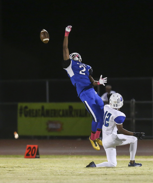 Basic’s DeShawn Eagles comes up short on a pass during a football game against Green V ...