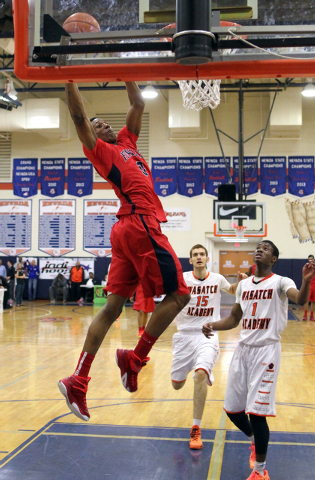 Findlay Prep forward Horace Spencer (0) prepares to dunk in front of Wasatch Academy center ...