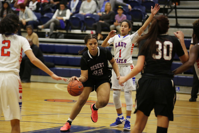 Desert Oasis junior Dajaah Lightfoot attempts to take the ball to the net on Monday, Feb. 6, ...