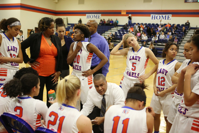 Bishop Gorman gathers during a break in the game on Monday, Feb. 6, 2017 at Bishop Gorman Hi ...