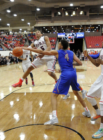 Bishop Gorman center Chase Jeter (4) strips the basketball away from Findlay Prep guard Derr ...