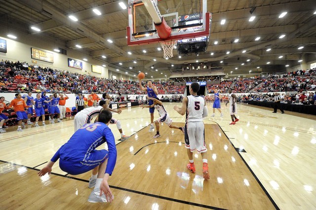 Bishop Gorman center Chase Jeter (4) attempts a layup as time expires against Findlay Prep g ...