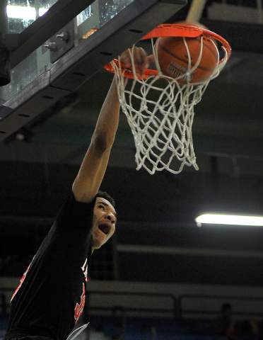 Las Vegas’ Tyler Bey dunks the ball against Canyon Springs on Monday. Bey had 23 point ...