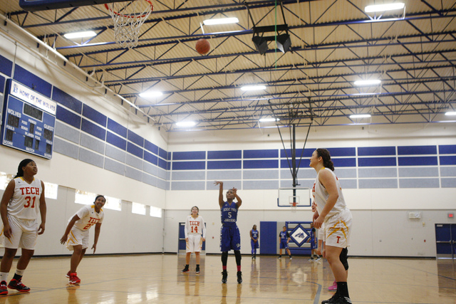 Desert Pines’ Chrystian Myles (5) shoots a free throw during Tuesday’s game agai ...