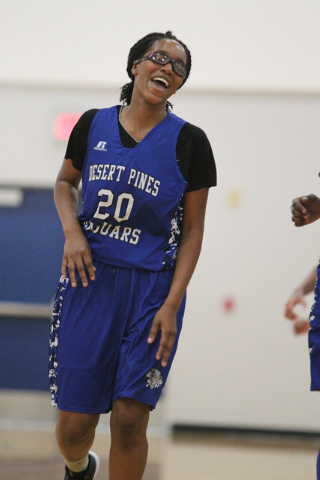 Desert Pines’ Adrianne Jackson (20) reacts after making a jump shot during a game agai ...