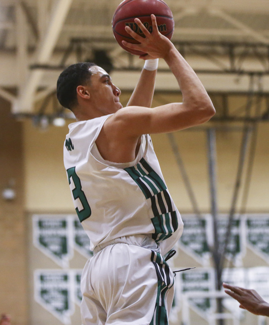 Rancho guard Chrys Jackson (3) goes up to score a three-pointer against Las Vegas during a b ...