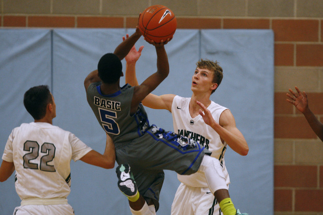 Palo Verde’s Grant Dressier defends a shot by Basic guard Kerry Keyes on Friday. Palo ...
